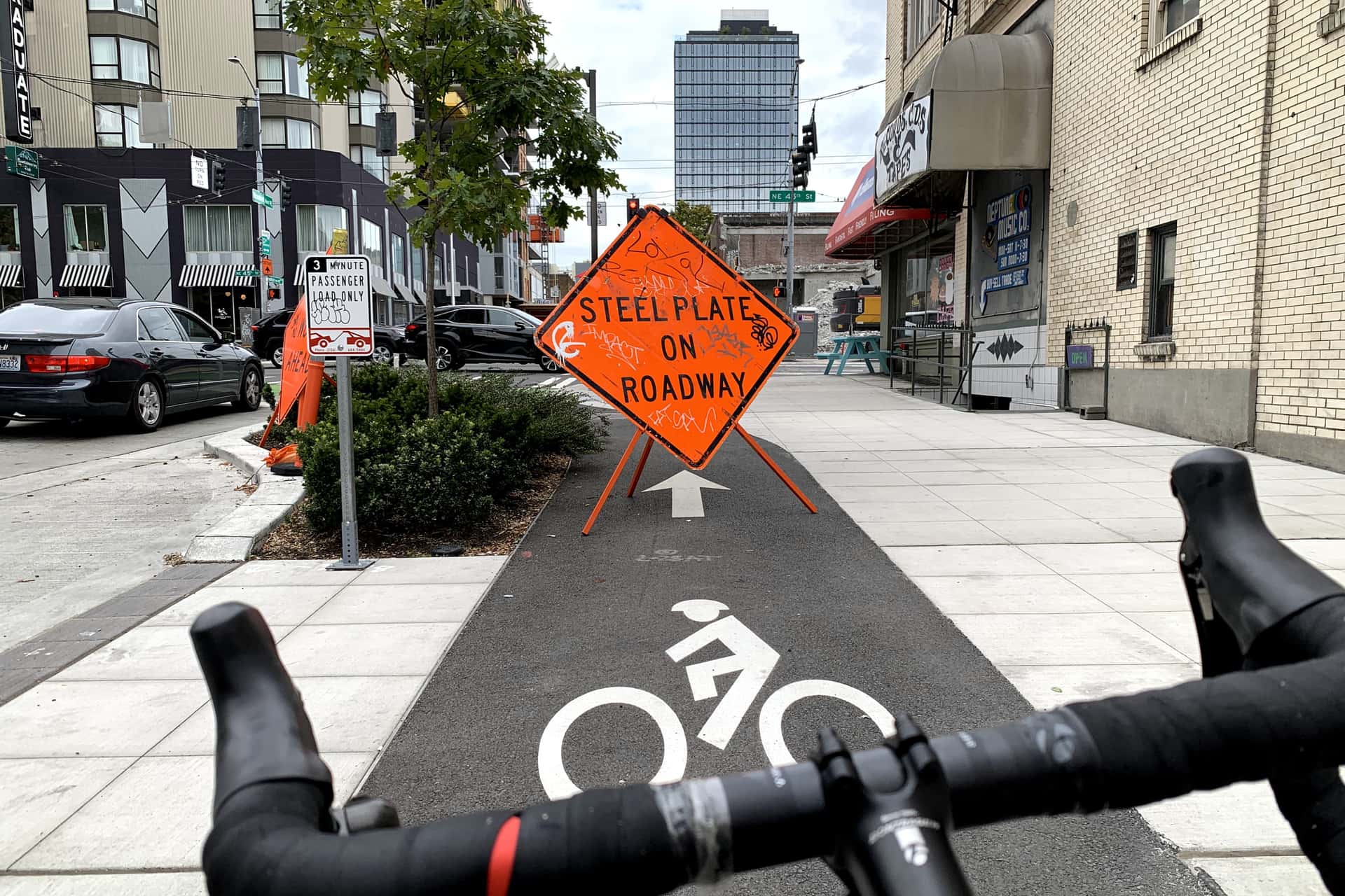 road sign obstructing a bike lane