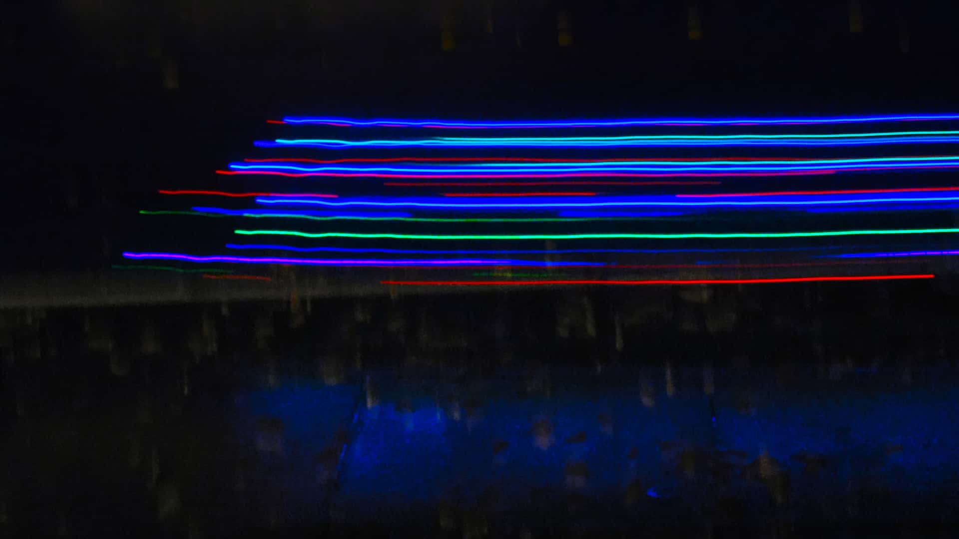 long exposure of a bicycle decorated with Christmas lights