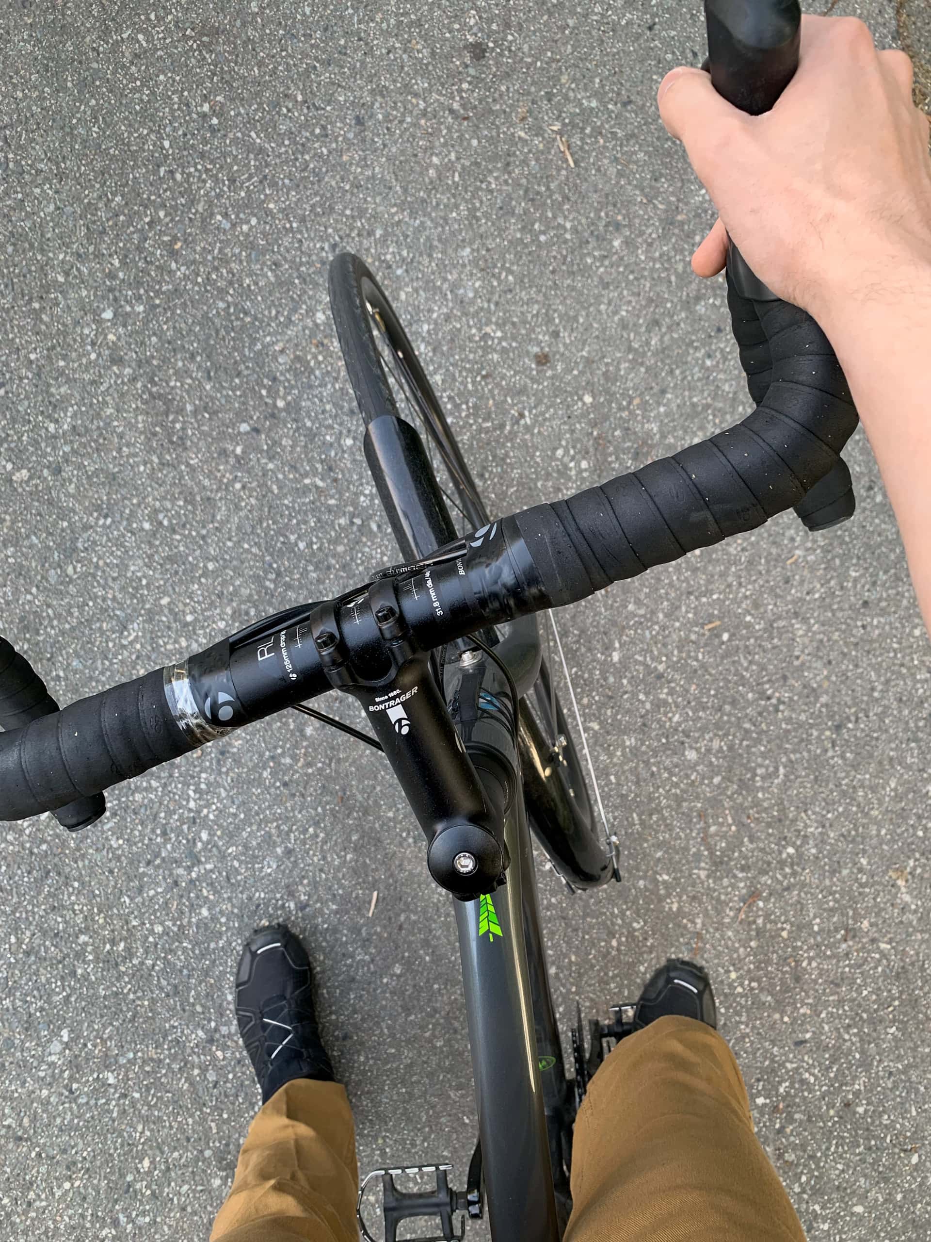 first-person perspective of straddling a bicycle