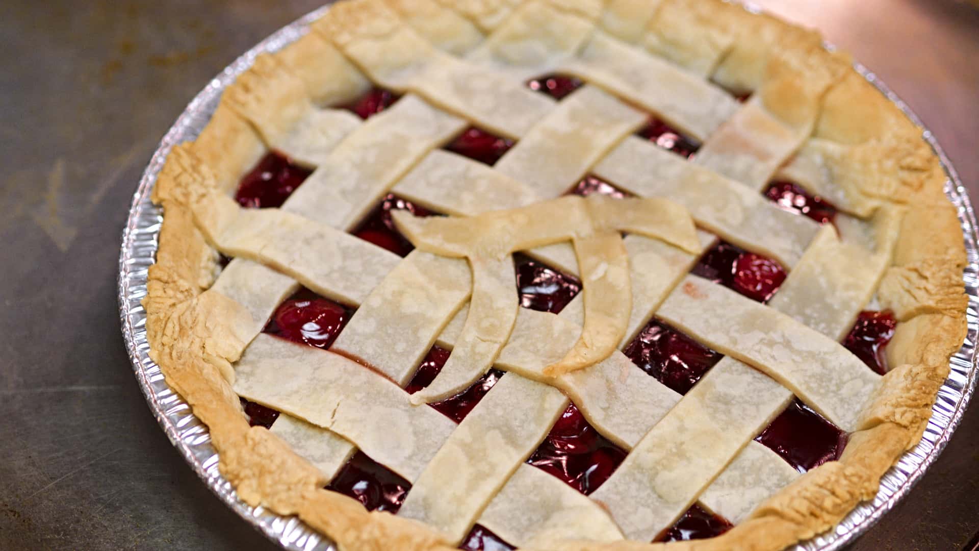 cherry pie decorated with a π symbol
