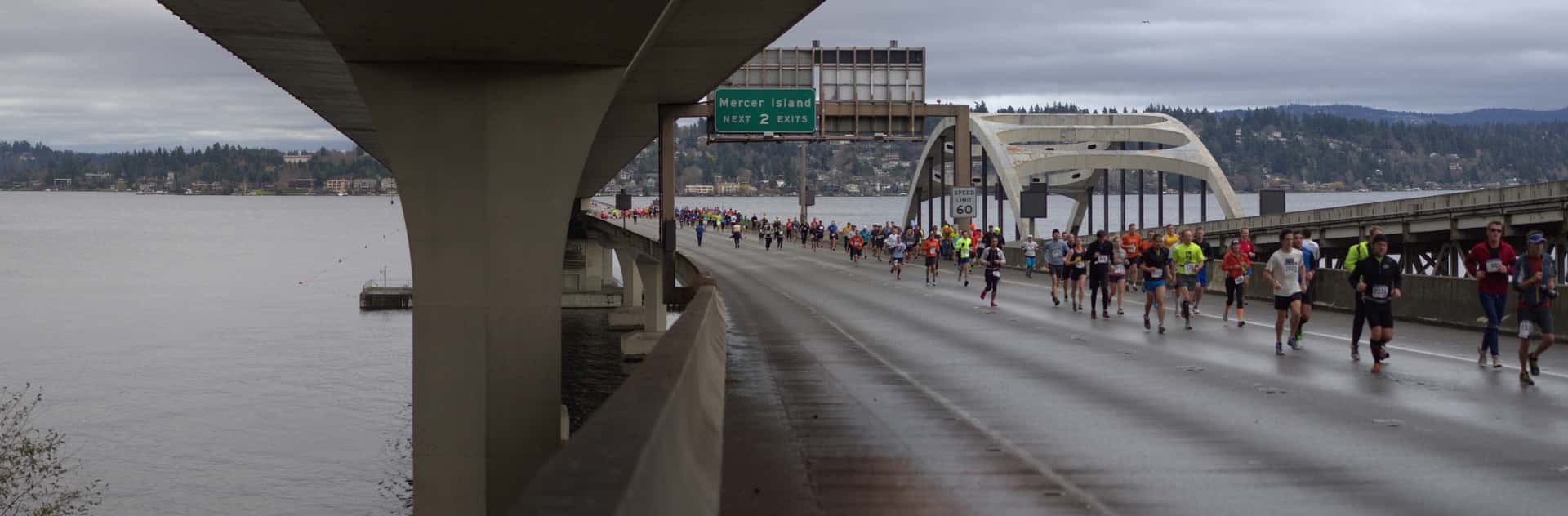 marathon runners on the I-90 floating bridge