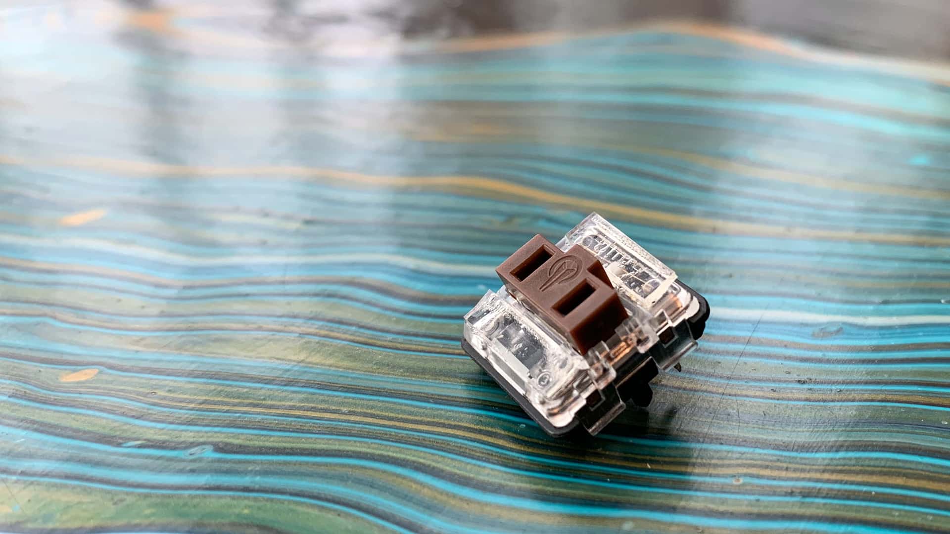 Kailh “Choc” Brown key switch silenced with 1-mm-thick adhesive silicone pads