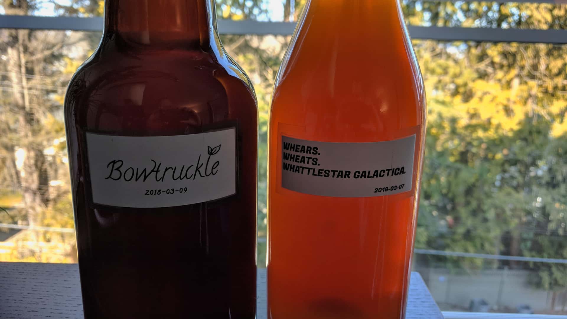 homebrew beer bottles labeled “Bowtruckle” and “Whears. Wheats. Whattlestar Galactica.”
