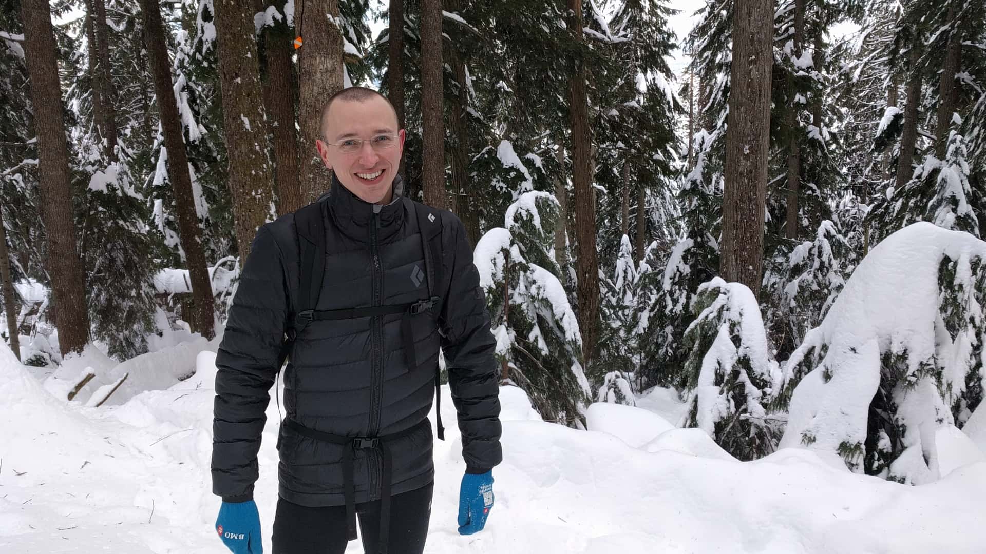 Andrew hiking in the snow on Mount Fromme